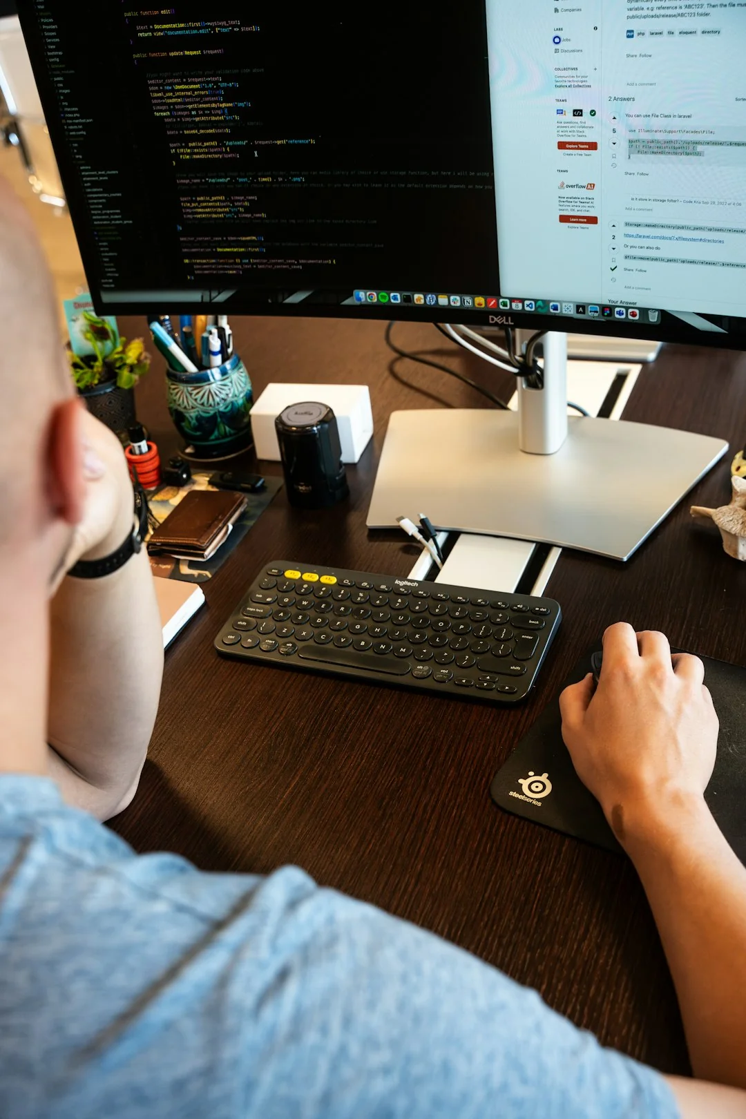 Wooden blocks spelling SEO on a laptop keyboard convey digital marketing concepts.